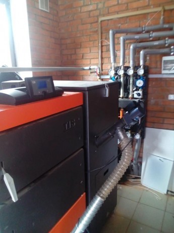 TIS Duo Pellet 40 - котел пеллетный автоматический