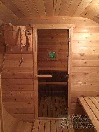КедрПром - баня-бочка из кедра квадратная длиной 4 метра с верандой