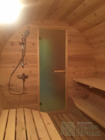 КедрПром - баня-бочка из кедра длиной 4,5 метра с козырьком и душем