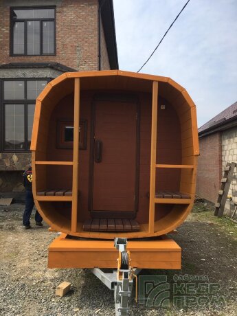 КедрПром - баня-бочка из кедра квадратная длиной 4,5 метра с верандой