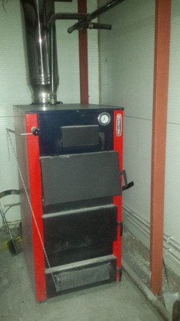 НМК Sunfire 75 - котел твердотопливный