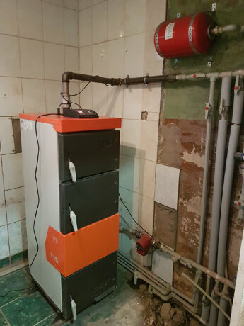 TIS PLUS 20 - котел полуавтоматический твердотопливный