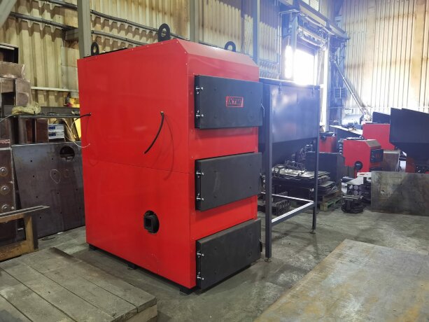 КТМ 30 - котел автоматический угольный (пеллетный)
